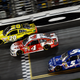 Drivers cross the finish line of the NASCAR Sprint Cup Series Budweiser Duel 1 race at Daytona International Speedway on Feb. 20, 2014, in Daytona Beach, Fla.
Jared C. Tilton/Getty Images